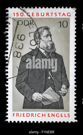 Gedruckt in DDR Stempel zeigt Friedrich Engels, Sozialwissenschaftler, politischer Theoretiker und marxistischen, ca. 1970 Stockfoto