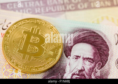 Bitcoin auf einer Bank des Iran banknote Stockfoto