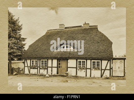 Fachwerkhaus mit Reetdach in Zirkow, Moenchgut-Granitz, Rügen, Mecklenburg-Western Pomerania, Deutschland, Europa Stockfoto