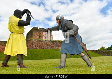 Reenactors mark 700 Jahre, da die Schotten unter der Leitung von Robert The Bruce Belagerung zu englischen Carlisle Castle legte Stockfoto