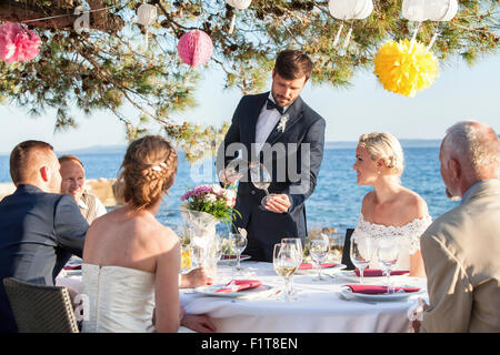 Hochzeitsparty am Strand Stockfoto