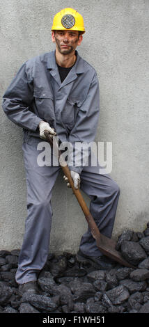 Arbeiten bei Schaufeln Bergmann Zeche Stockfoto