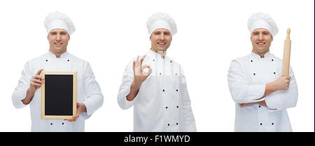 glücklich männlichen Chef Bäcker mit Speisekarte an Bord zeigen ok Stockfoto