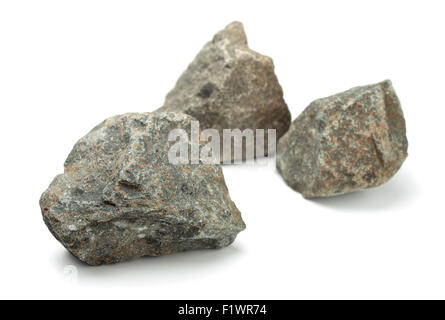 Drei Stücke von rohen Felsen isoliert auf weiss Stockfoto