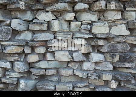 alte Steinmauer wie ein Hintergrund. Stockfoto