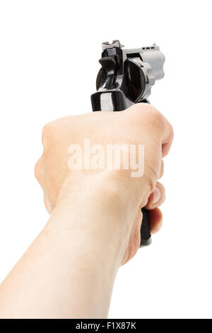 Revolver Pistole in der Hand auf dem weißen Hintergrund. Stockfoto