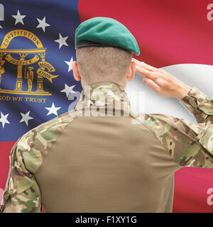 Soldat grüßte uns State Flag Serie - Georgien Stockfoto