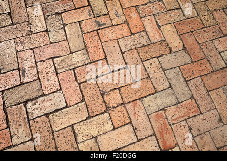 Alte rote Kopfsteinpflaster, Foto Hintergrundtextur Stockfoto