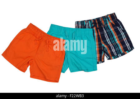 Drei farbige Shorts, orange, blau und Karo. Isolieren Sie auf weiß. Stockfoto