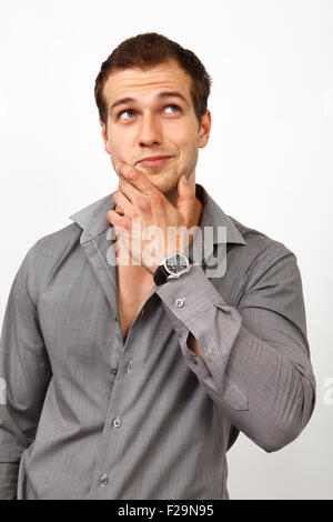 Kreative nachdenklicher Mann eine Idee und nachschlagen Stockfoto