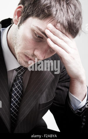 Porträt von depressiv traurig müde Geschäftsmann Stockfoto
