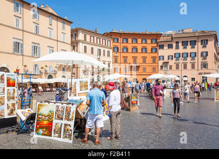 Künstler malen und Verkauf von Kunstwerken in der Piazza Navona-Rom Italien Roma Lazio Italien EU-Europa Stockfoto