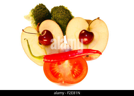 On / Gesicht: Kirschen, Apfel, Tomate, Brokkoli, Chilly - Symbolbild Nahrungsmittel. Stockfoto