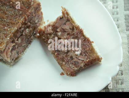 Sülze Kalbfleisch - Aufschnitt Gericht aus Kalbfleisch, manchmal Schweinefleisch, Lager, Zwiebeln und Gewürzen wie allspice.traditional Gericht für Chris Stockfoto