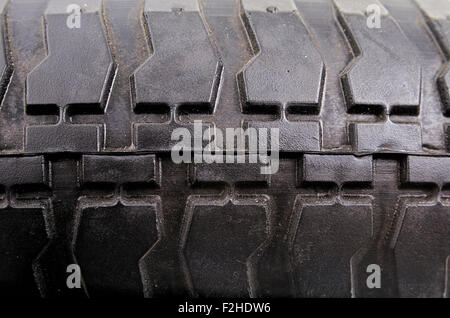 Auf neue Schubkarre Art Reifen treten Stockfoto