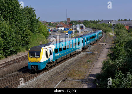 Arriva Trains Wales 175 108 durchläuft Sutton Brücke Kreuzung mit 1V39 1030 Manchester Piccadilly nach Milford Haven am 11/06 Stockfoto