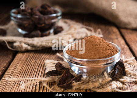 Cola Nuss Powder(close-up shot) auf Vintage Holz-Hintergrund Stockfoto