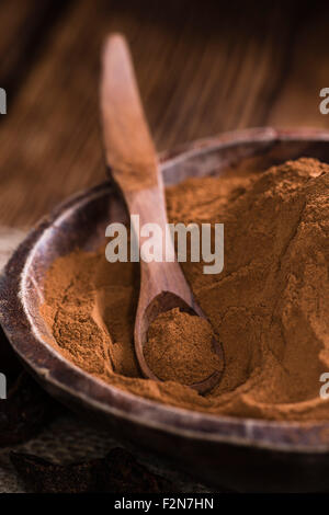 Cola Nuss Powder(close-up shot) auf Vintage Holz-Hintergrund Stockfoto