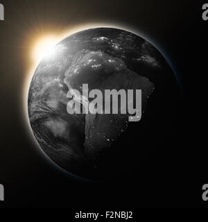 Sonne über Südamerika auf dunkler Planet, die, den Erde auf schwarzem Hintergrund isoliert. Hochdetaillierte Planetenoberfläche. Elemente dieses Bildes Stockfoto