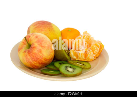 Äpfel, Kiwi, Mandarinen auf einem Ton-Platte Stockfoto