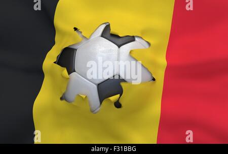 Flagge von Belgien und Soccer Ball, Loch in der Flagge Stockfoto