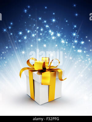 Weißen Geschenkbox mit Goldband auf einem glänzenden blauen Hintergrund mit Starlight explosion Stockfoto