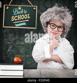 Zusammengesetztes Bild von niedlichen Schüler im Laborkittel Stockfoto