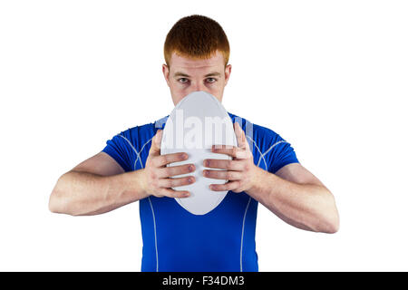Rugby-Spieler mit Rugby-ball Stockfoto