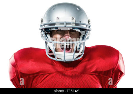 Aggressive American Footballspieler in roten Trikots zu schreien Stockfoto