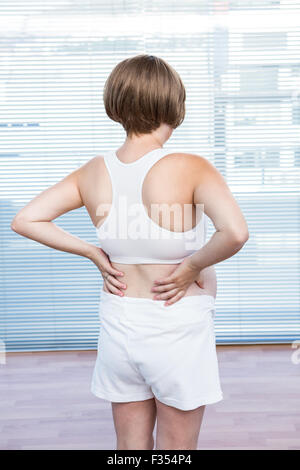 Rückansicht des schwangeren Yoga Training Stockfoto