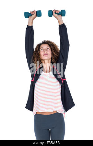 Frau, die das Training mit Hanteln Stockfoto