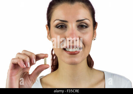 Close-up Portrait glücklich Frau mit Pille Stockfoto