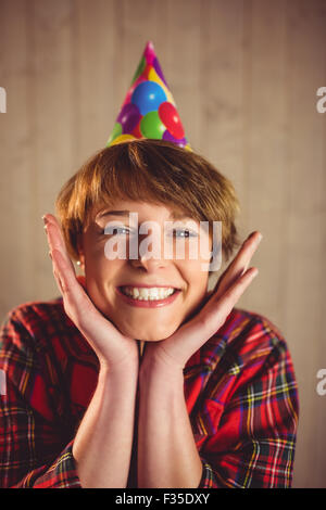 Attraktive junge Frau trägt Hut party Stockfoto