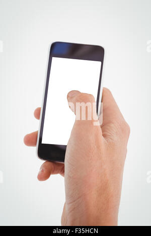 Abgeschnitten von Menschenhand mit Handy Stockfoto