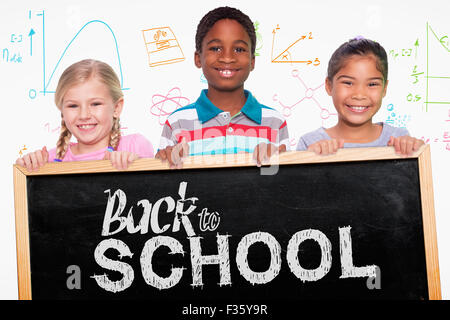 Zusammengesetztes Bild der Grundschule Schüler lächelnd Stockfoto