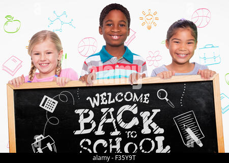 Zusammengesetztes Bild der Grundschule Schüler lächelnd Stockfoto
