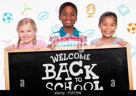 Zusammengesetztes Bild der Grundschule Schüler lächelnd Stockfoto