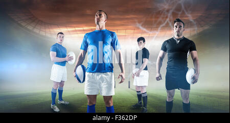 Zusammengesetztes Bild des Rugby-Spieler mit Rugby-ball Stockfoto