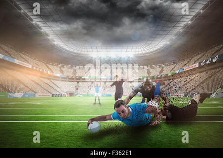 Zusammengesetztes Bild des Rugby-Spieler tun einen Drop kick Stockfoto