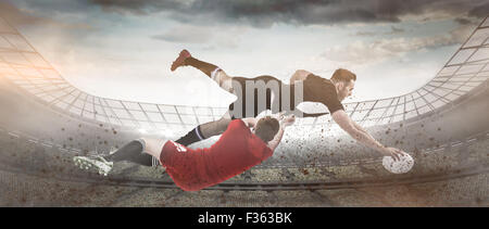 Zusammengesetztes Bild ein Rugby-Spieler, erzielte einen Versuch Stockfoto