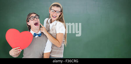 Zusammengesetztes Bild aufgeregt geeky Hipster und seine Freundin Stockfoto