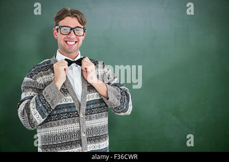 Zusammengesetztes Bild glücklich geeky Hipster mit Wolljacke Stockfoto