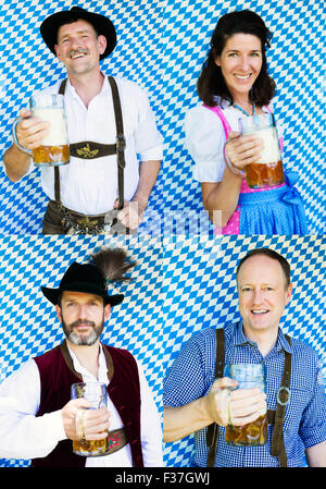 mehrere Gesichter von Menschen in bayerischer Tracht halten Bierkrüge Stockfoto