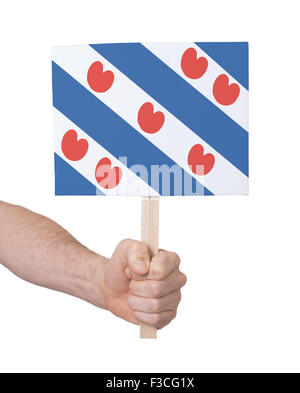 Hand, die kleine Karte, isoliert auf weiss - Flagge Friesland Stockfoto