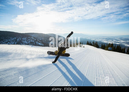 Downhill Snowboard Mann Stockfoto