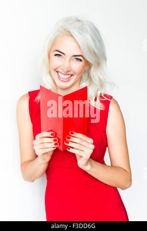 Studioaufnahme Frau mit rotem Kleid Stockfoto