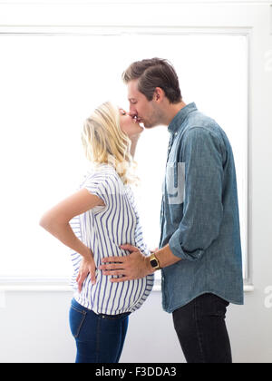 Mann mit schwangeren Frau Stockfoto