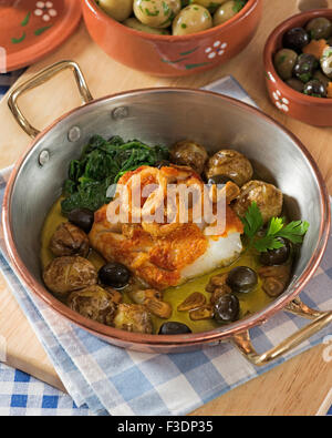 Bacalhau À Lagareiro. Kabeljau in Olivenöl. Portugal-Essen Stockfoto