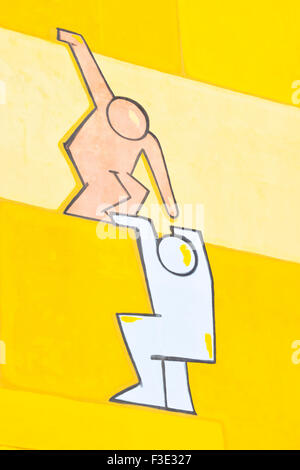 Dazu bei, um eine Mauer zu klettern. Stockfoto