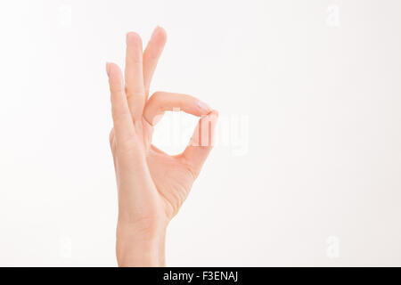 Zarte Frauenhand zum Ausdruck bringen Erfolg Stockfoto